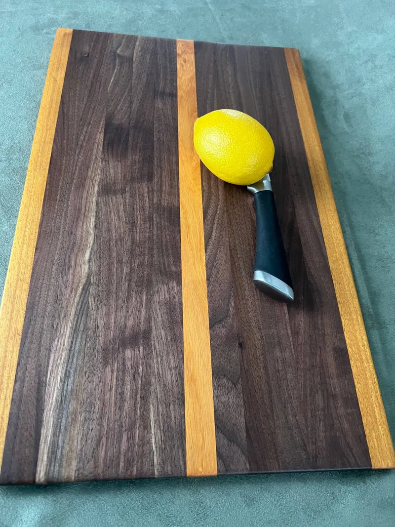 A black walnut and osage orange cutting board